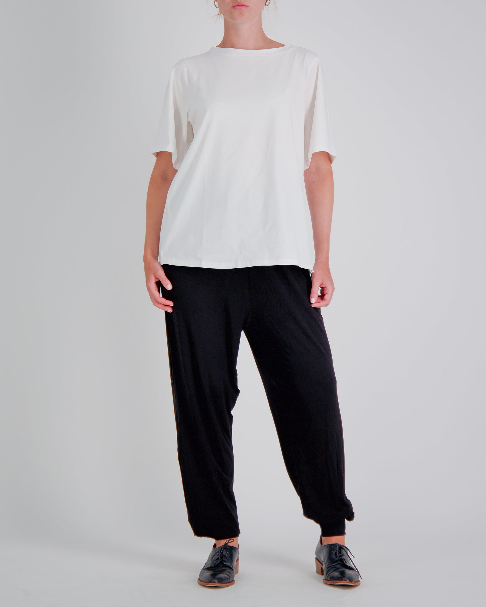 White Lilli Leaf Back T-Shirt by Christina Stephens, featuring stain and spill resistance for enhanced dexterity support.