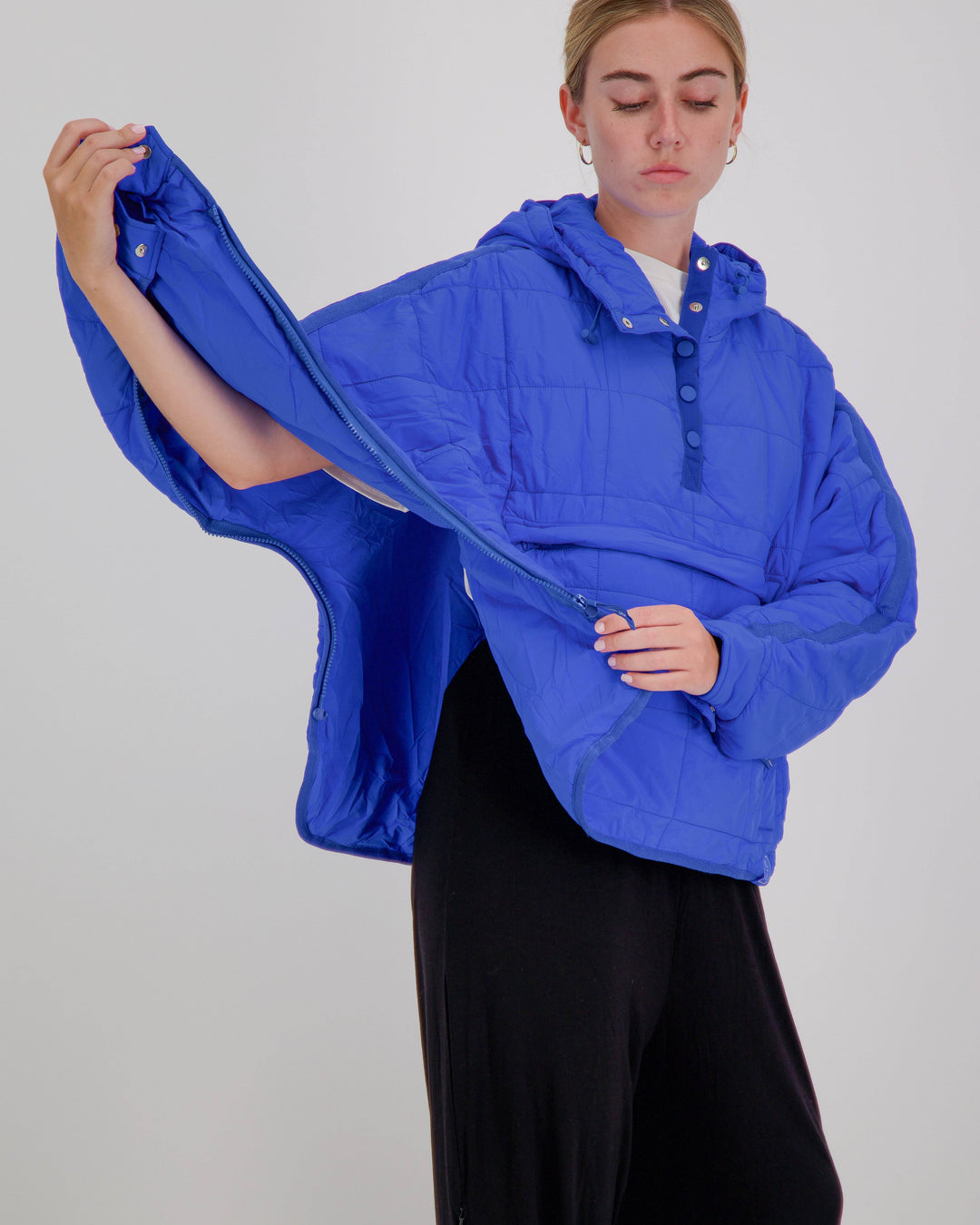 Blue Christina Stephens Elly Universal Adaptive Puffer Jacket designed for wheelchair users, showcasing its adaptive features.