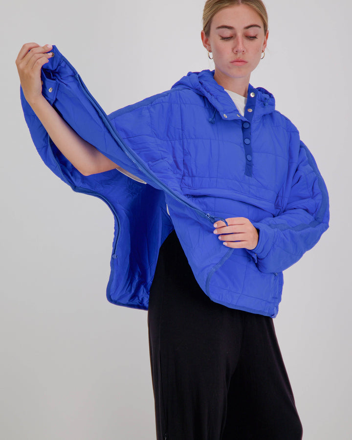 Blue Christina Stephens Elly Universal Adaptive Puffer Jacket designed for wheelchair users, showcasing its adaptive features.