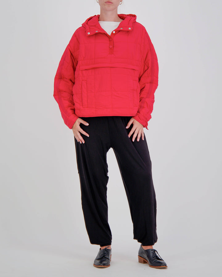 Red Elly Universal Adaptive Puffer Jacket by Christina Stephens designed for wheelchair users, showcasing a stylish and functional fit.