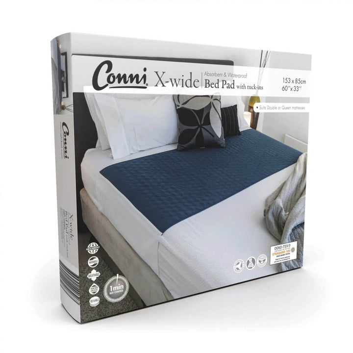 Conni X-wide Bed Pad with Tuck-ins in soft fabric, designed for comfort and protection on a mattress.
