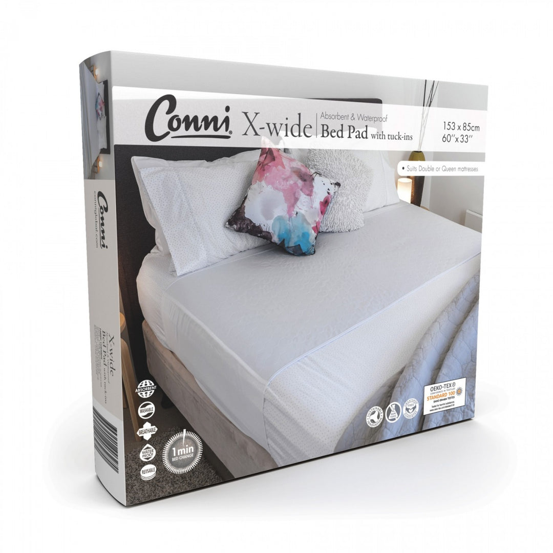 Conni X-wide bed pad with tuck-ins, featuring soft fabric and waterproof protection for added comfort and security.
