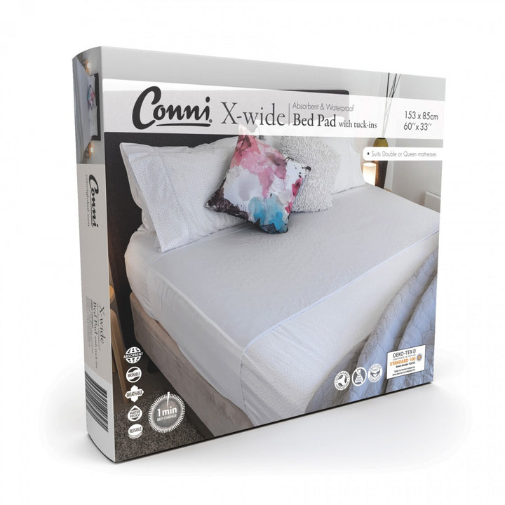 Conni X-wide bed pad with tuck-ins, featuring soft fabric and waterproof protection for added comfort and security.