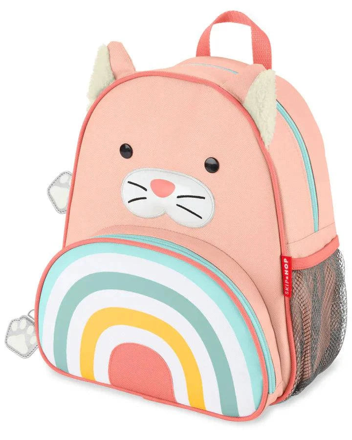 Image of a cute cat next to a Tubie Fun Modified Backpack for nutrition, designed for easy feeding and medical use.