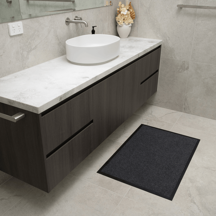 Charcoal Staydry Absorbent Floor Mat by Stay Dry Products, Manchester style, featuring a soft, durable fabric surface for floor protection.