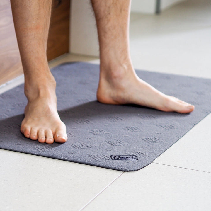 Grey Conni anti-slip and absorbent Manchester floor mat, classic design, ideal for safe, dry flooring.