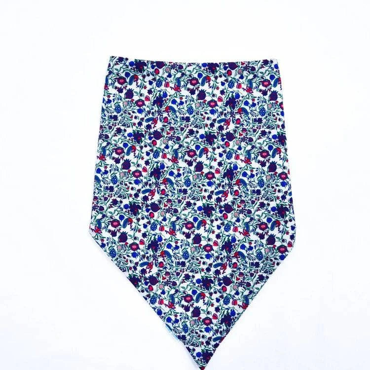 Adult waterproof and absorbent Brolly Bandana from Brolly Sheets, showcasing its adaptive clothing design in a garden setting.
