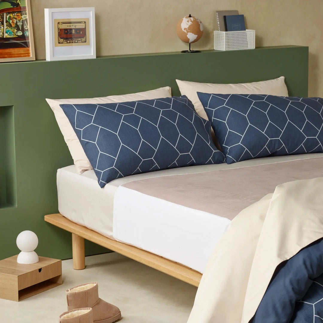 Stylish incontinence-friendly bedding set with waterproof, breathable sheets and discreet absorbent layers for all-night dryness. Hypoallergenic bed set blends functionality with modern bedroom aesthetics. Machine-washable and durable.