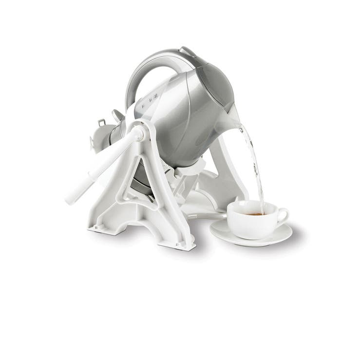 Homecraft Universal Kettle Tipper holding a kettle
