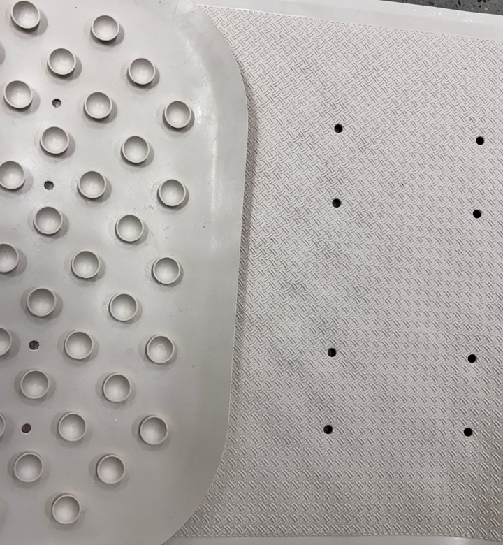 Performance Health Homecraft Everyday Bath Mat with textured surface for non-slip safety in bathroom.