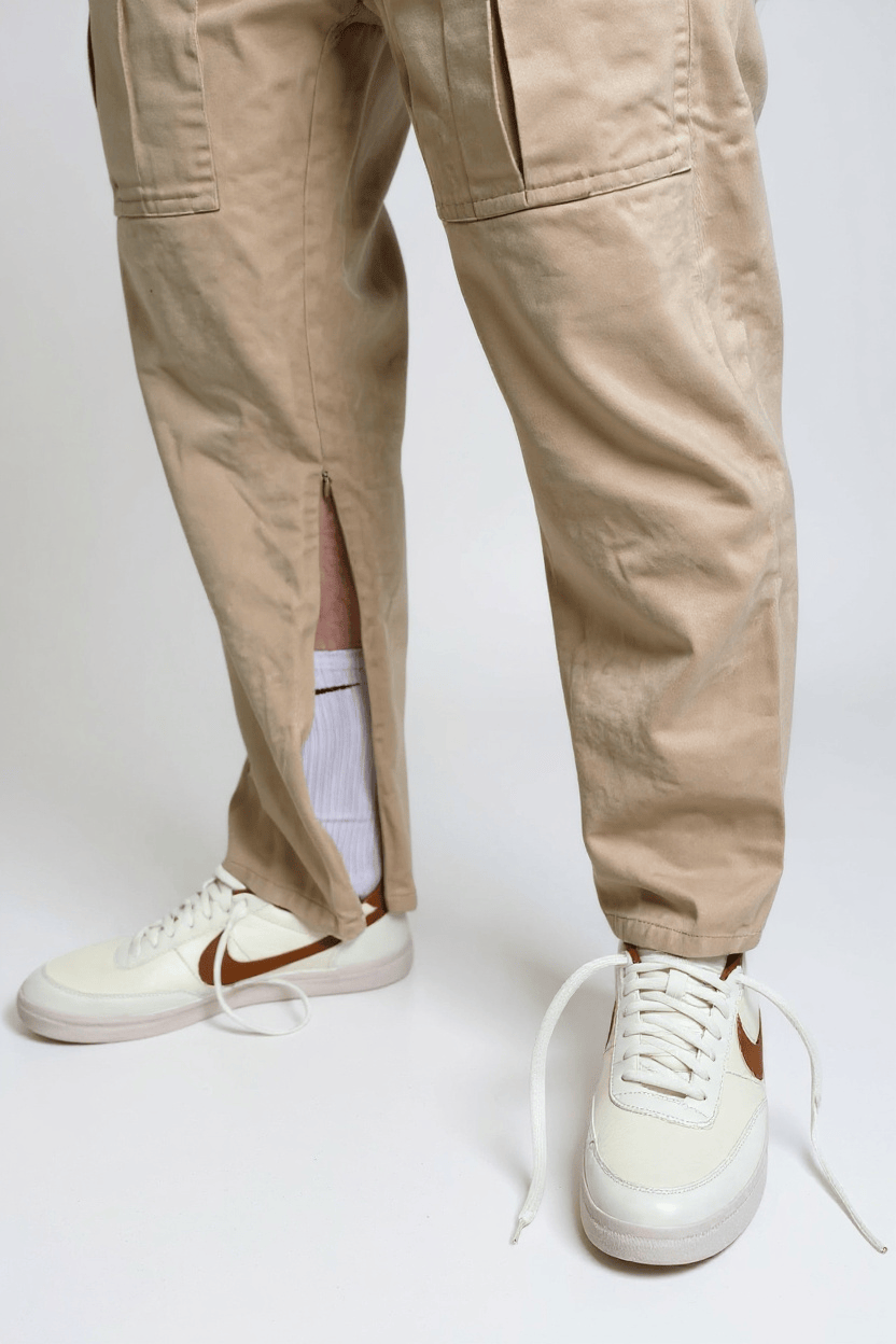 Side access cargo pants by JAM the Label in a stylish design, featuring multiple pockets and a relaxed fit.