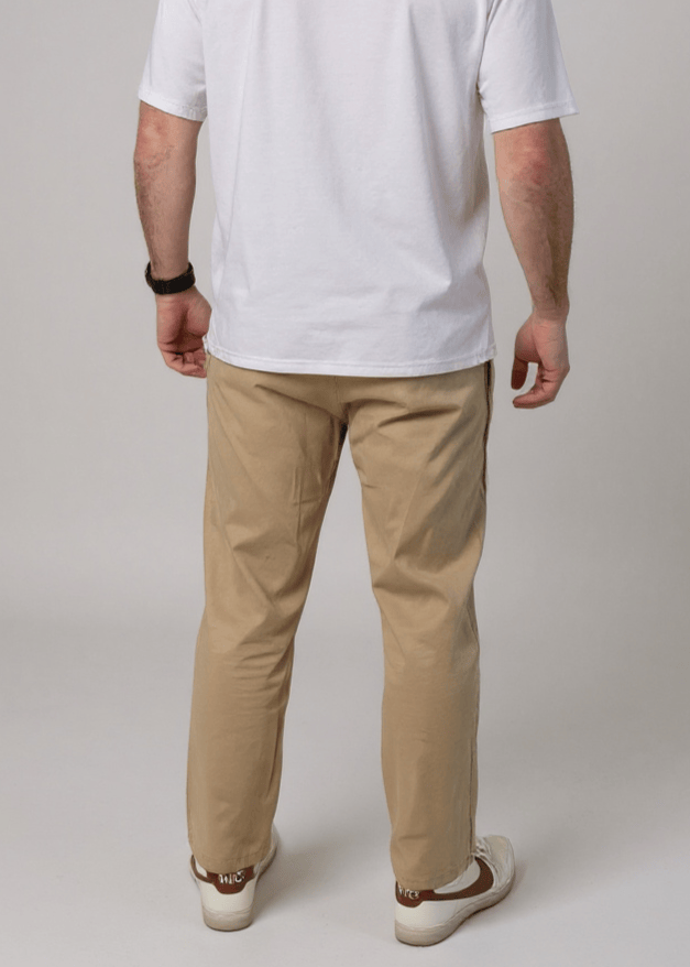 JAM the Label side access cargo pants in olive green, featuring multiple pockets and a relaxed fit, displayed on a model.