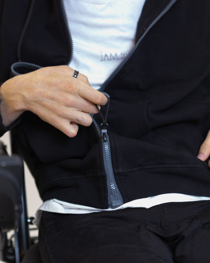 JAM the Label magnetic hoodie in soft fabric, featuring a relaxed fit and adjustable hood, displayed on a neutral background.