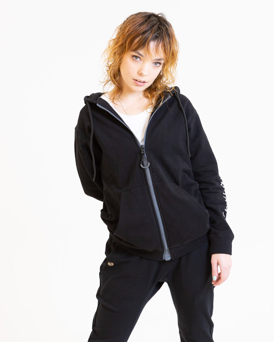 JAM the Label magnetic hoodie displayed on a mannequin with a cozy hood and stylish design in a neutral color.