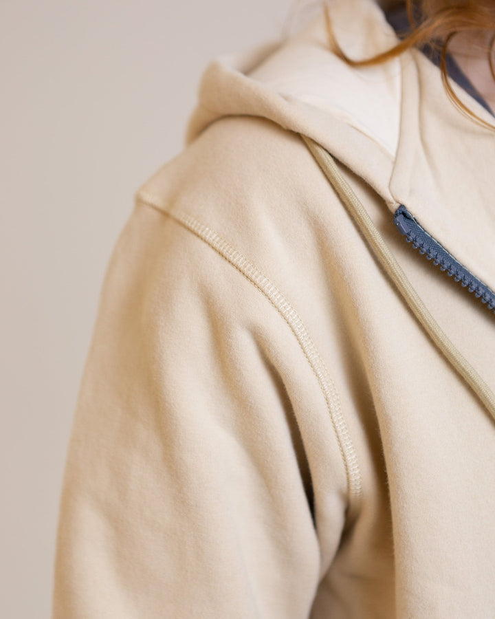 Cozy JAM the Label Magnetic Hoodie in soft fabric, featuring a relaxed fit and stylish magnetic closures.