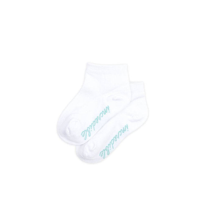 Colorful Sanguine Crew kids socks featuring playful patterns, perfect for keeping little feet cozy and stylish.
