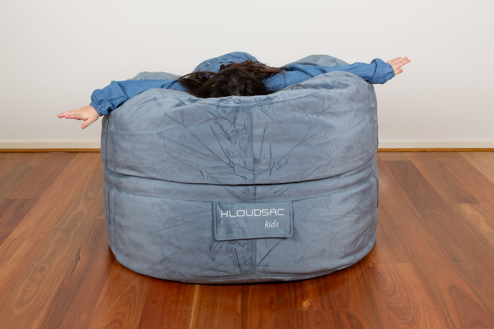 Small KloudSac for kids in vibrant colors, showcasing soft fabric and comfortable design for playtime and relaxation.