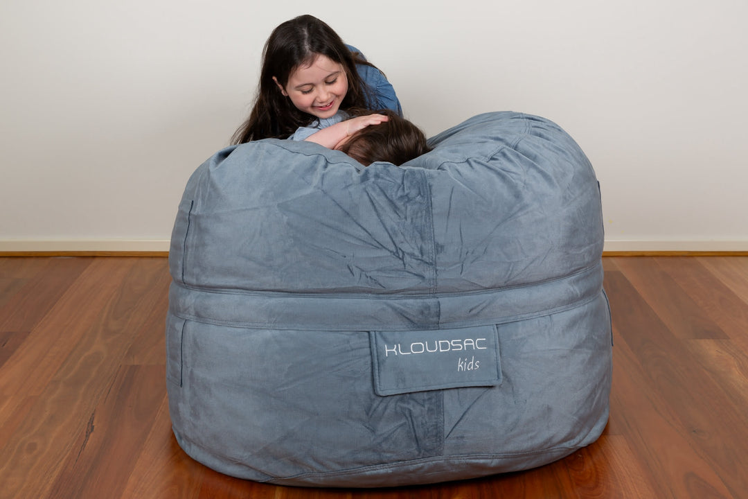 Small KloudSac for kids in vibrant colors, featuring a cozy, plush design perfect for lounging and playtime.