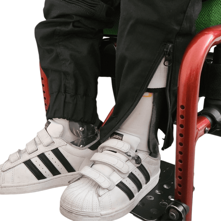 Kids' RareWear OrthoEase Signature clothing in black, featuring a comfortable and stylish design for everyday wear.