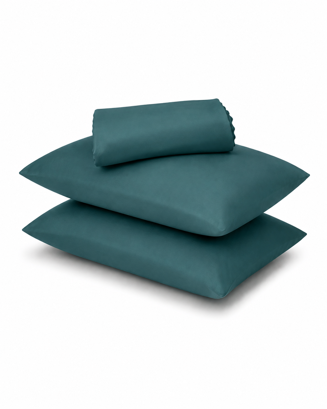 A stack of three teal pillows, including one folded sheet or pillowcase on top, photographed on a clean white background.