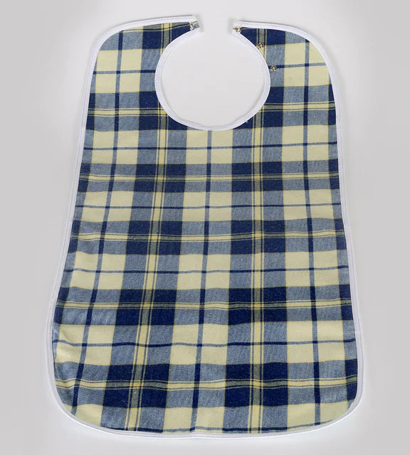 Navy tartan Brolly Feeding Bib from Brolly Sheets, an adaptive clothing item with waterproof fabric and adjustable neck strap.