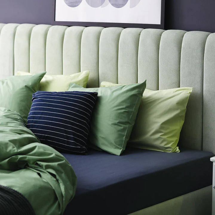 Navy waterproof cotton fitted sheet by Brolly Sheets, designed for Manchester beds, showcasing soft fabric and snug fit.