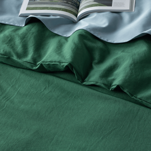 Olive green StayDry linen look water-resistant quilt cover set with detailed stitching, made of Manchester fabric.