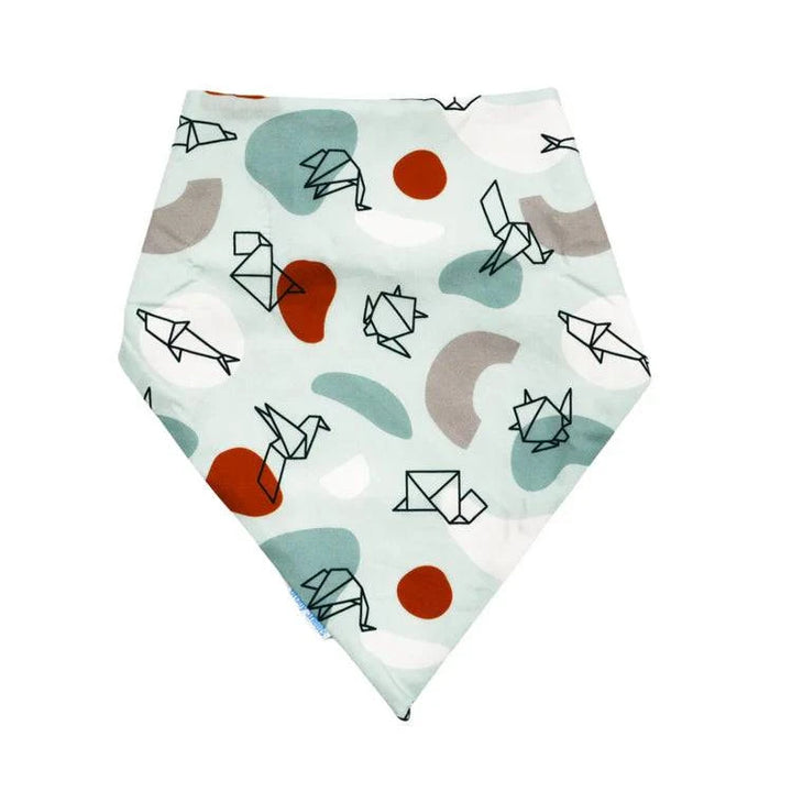 Child wearing a colorful Brolly Cotton Bandana by Incare Supports, an adaptive clothing accessory with origami-inspired design.