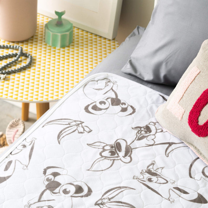 Conni Kids Bed Pad featuring Aussie Animals design, soft fabric, and absorbent layer for children's bedding protection.
