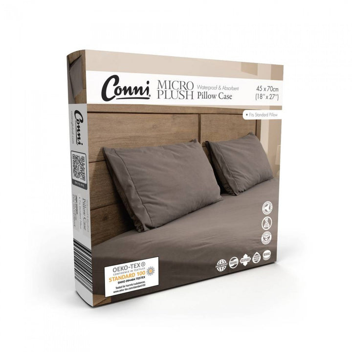 Conni Micro-Plush pillow protector in charcoal, soft Manchester fabric designed to protect and enhance pillows.