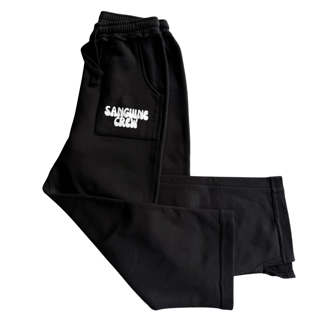 Sanguine Crew kids' track pants in side view showcasing logo design and comfortable fit.