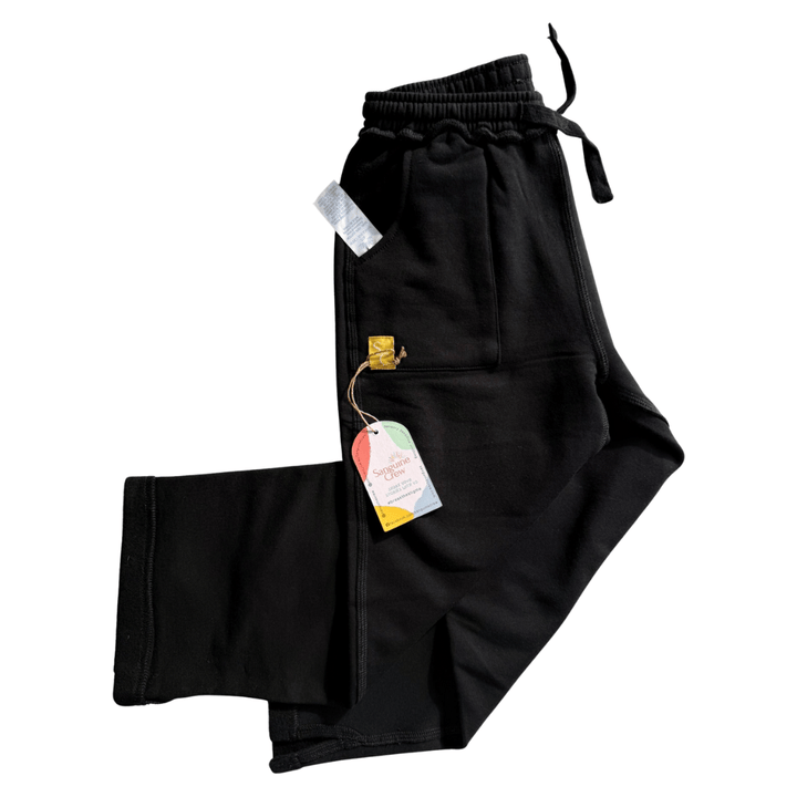 Sanguine Crew kids' track pants in a side view, featuring a comfortable fit and stylish design for active play.