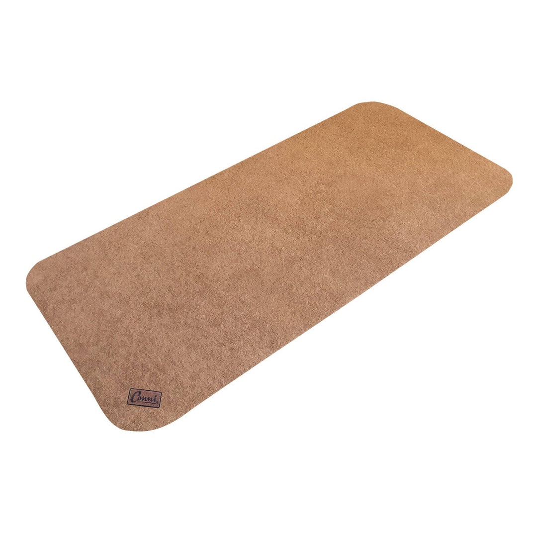 Conni anti-slip and absorbent pebble floor runner mat in a long Manchester style for safety and comfort.