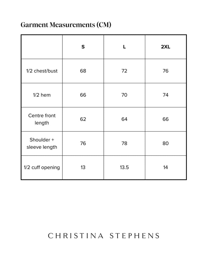Blue adaptive puffer jacket by Christina Stephens designed for wheelchair users, featuring a functional and stylish design.