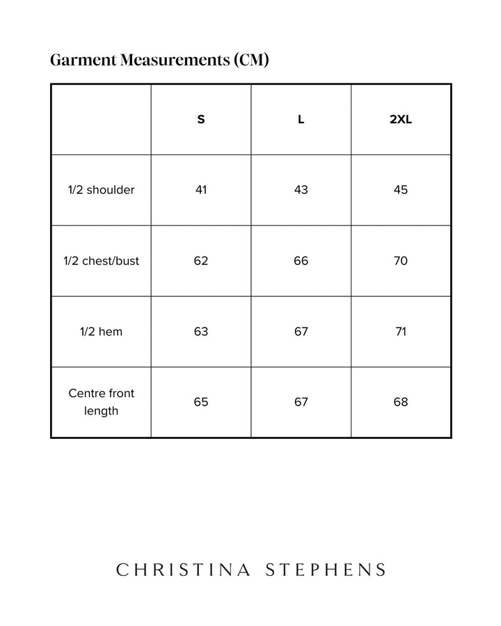Size chart for Puffer Vest | Adaptive Clothing for People with Disabilities and Wheelchair Users - Red displaying measurements in centimeters across three sizes: S, L, and 2XL. Shows half shoulder, chest/bust, hem, and center front length measurements in a clean, minimalist table format.