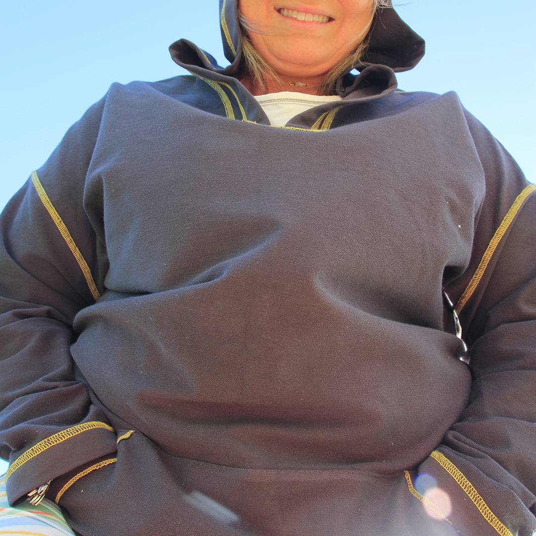 Sanguine Crew adults hoodie in a cozy, relaxed fit with a drawstring hood and front pocket, displayed on a neutral background.