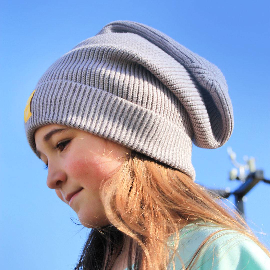Sanguine Crew bamboo knitted beanie in a cozy, ribbed design, showcasing a stylish, soft fabric for warm winter wear.