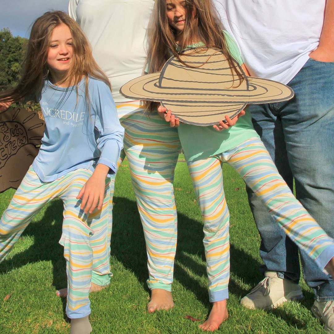 Sanguine Crew kids' bamboo lounge pants in a soft, comfortable fabric, featuring a relaxed fit and playful design.