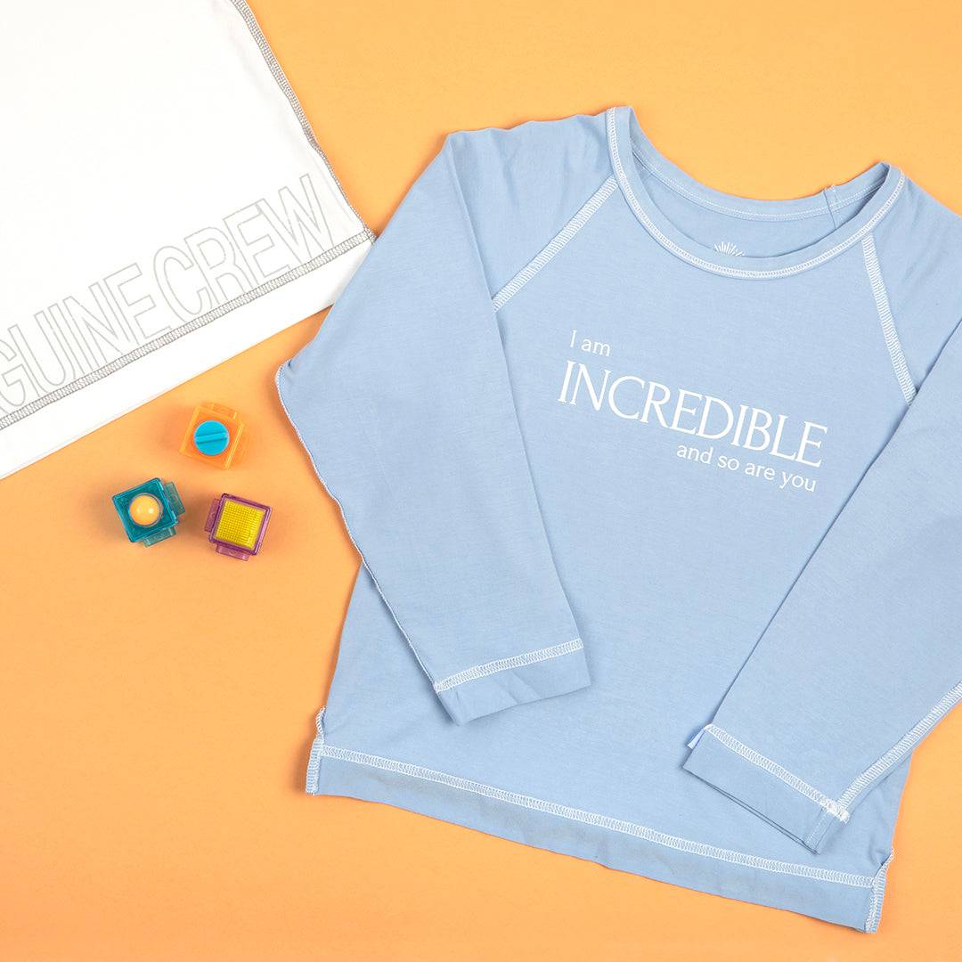 Blue long sleeve bamboo t-shirt for kids by Sanguine Crew, featuring a comfortable fit and soft fabric.