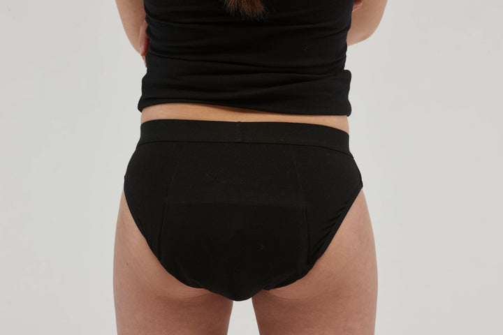 Black Staydry Teen Undies by Stay Dry Products, front view showing comfortable fit and seamless design for teens.