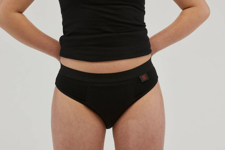 Black Staydry Teen Undies by Stay Dry Products, front view showing comfortable fit and seamless design for teens.