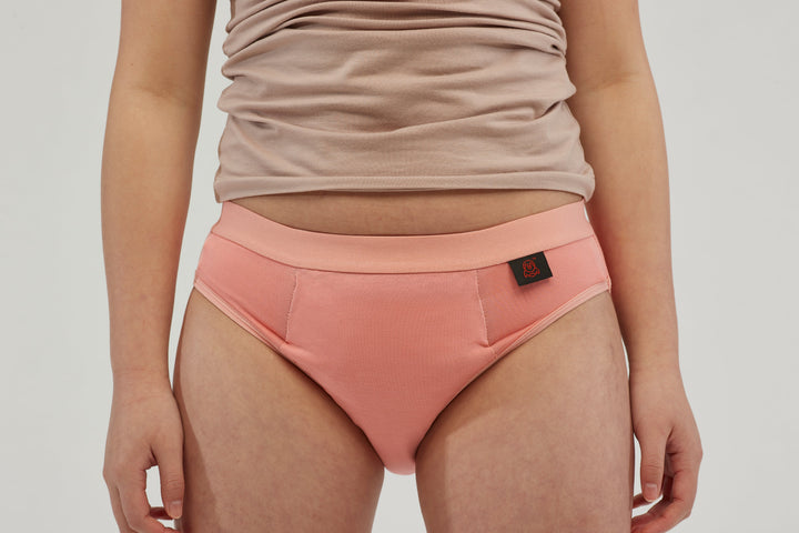Pink Staydry Teen Undies by Stay Dry Products with a comfortable fit, shown from the front view.