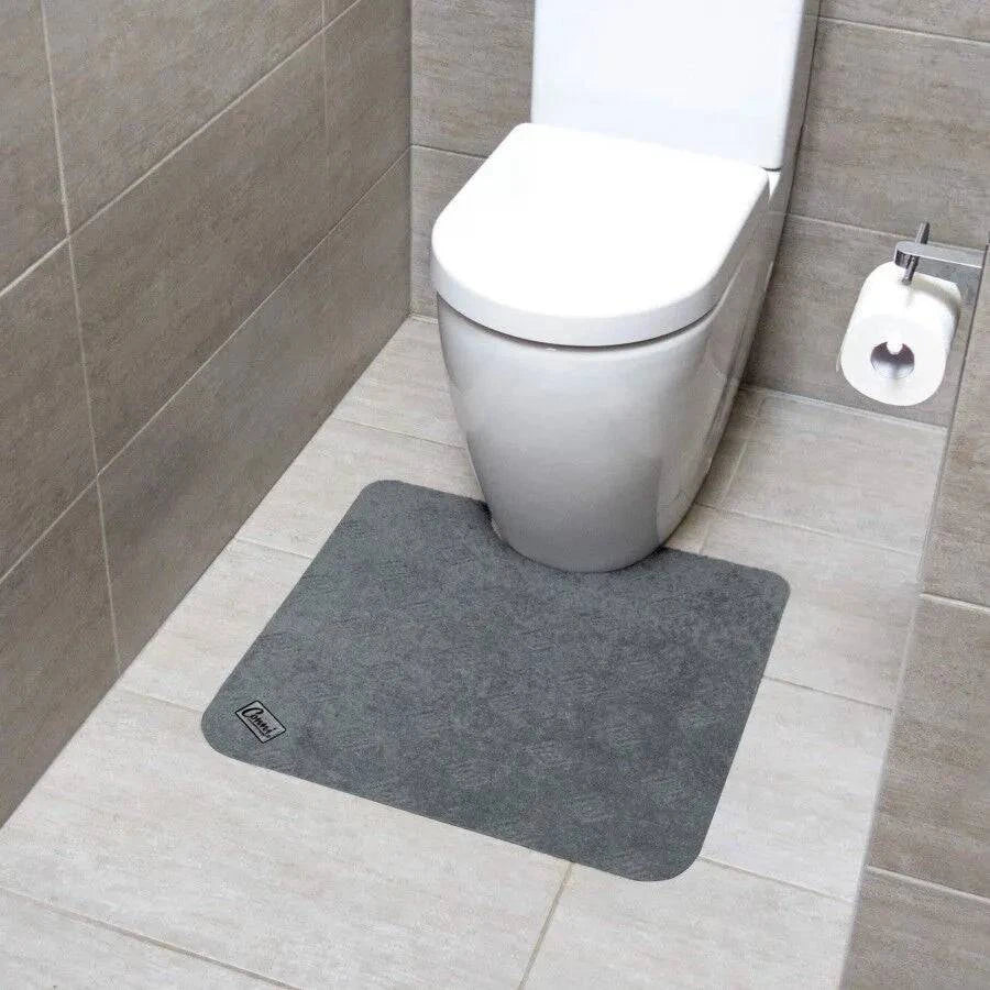 Grey Conni Manchester toilet floor mat with soft, absorbent fabric and non-slip backing for bathroom safety and comfort.