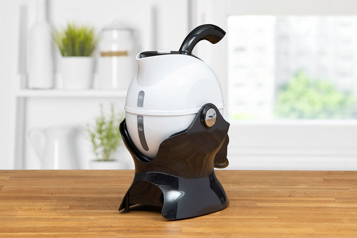 Black and white Uccello kettle by Instacare Shop, front view showing sleek, modern design and handle.