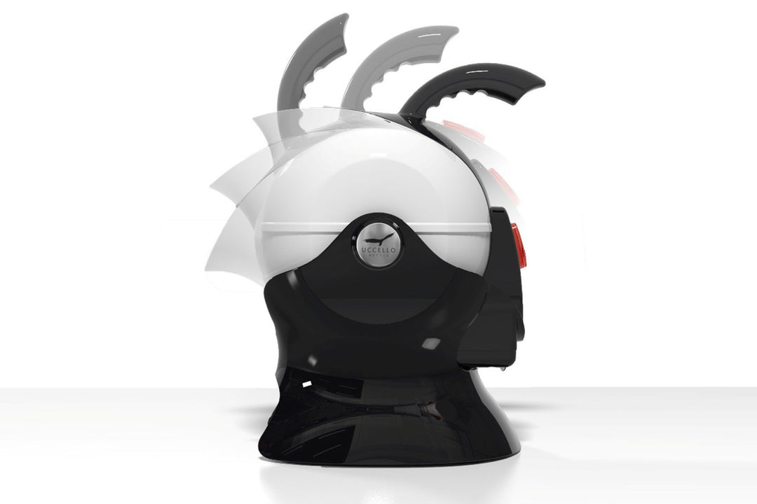 Black and white Uccello Kettle with rotating handle, modern appliance accessory from Instacare Shop.