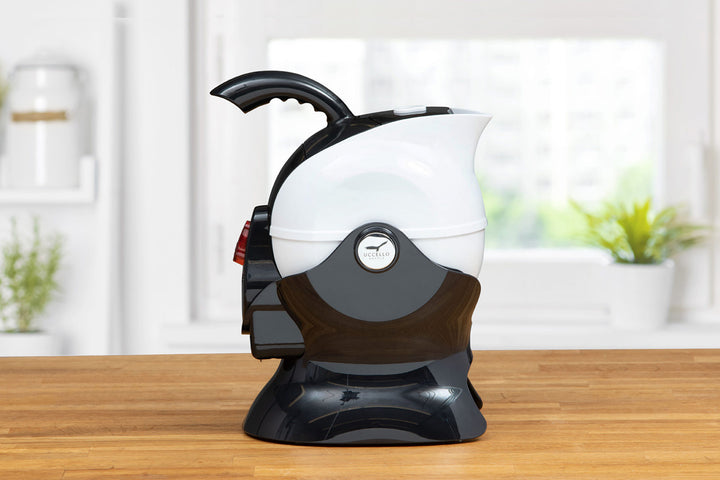 Black and white Uccello kettle from Instacare Shop, side view showing modern electric kettle with sleek design.