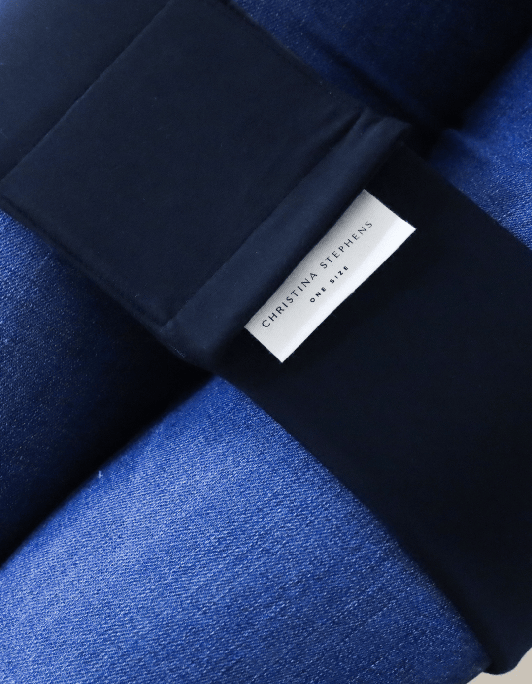 Christina Stephens adaptive wheelchair leg straps accessory showing adjustable straps with buckles for secure leg support.