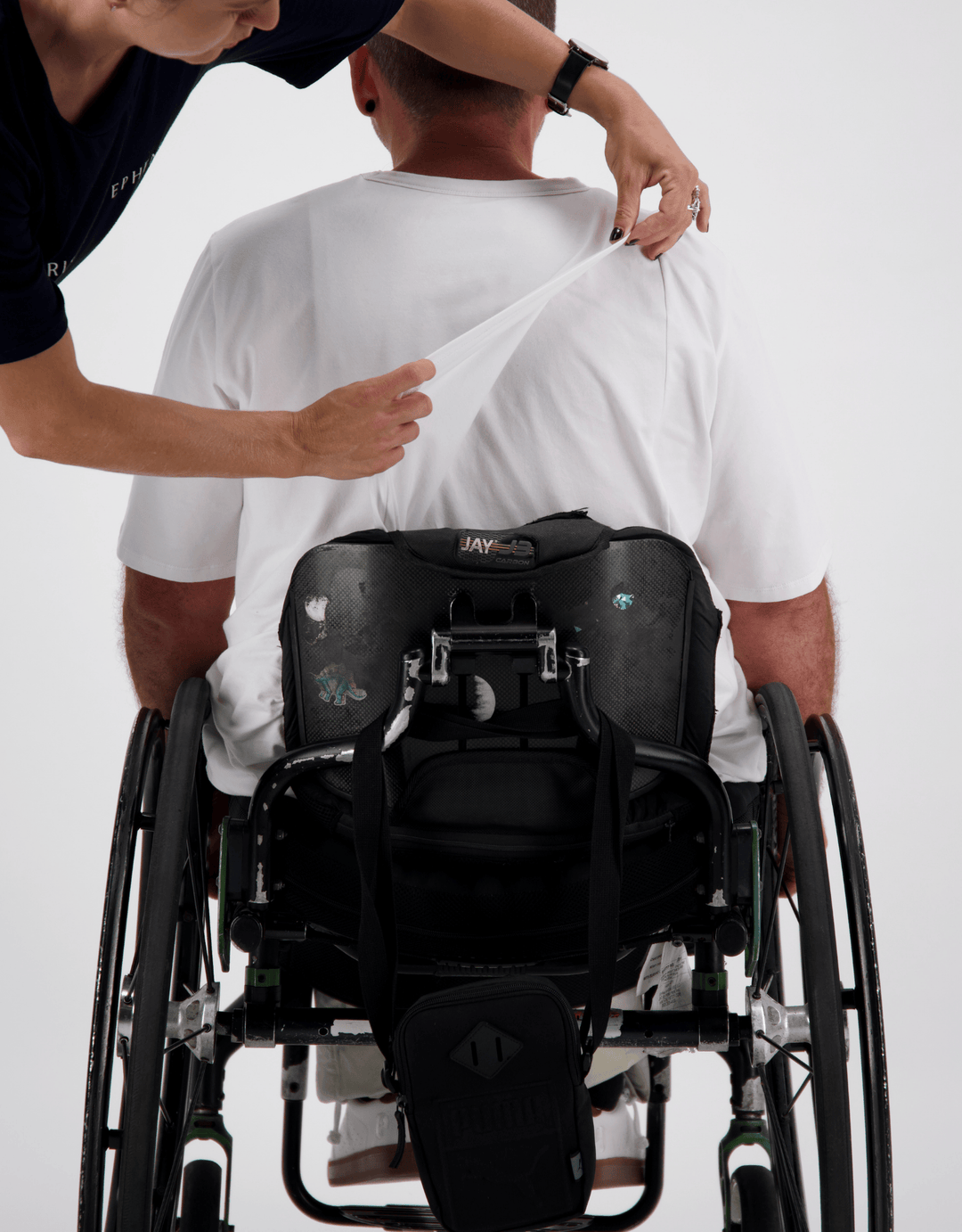Christina Stephens Prism Back adaptive T-shirt with open back design, soft fabric, and stylish fit, perfect for casual wear.