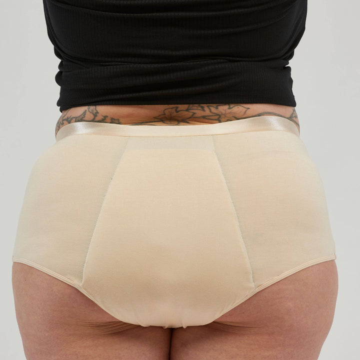 Staydry women's full brief in skin tone, designed for continence protection and comfort.