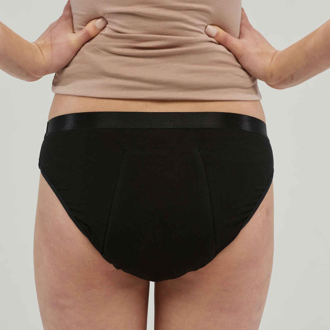 Black women's Staydry hipster brief for continence, showing back view with comfortable fit and discreet design.